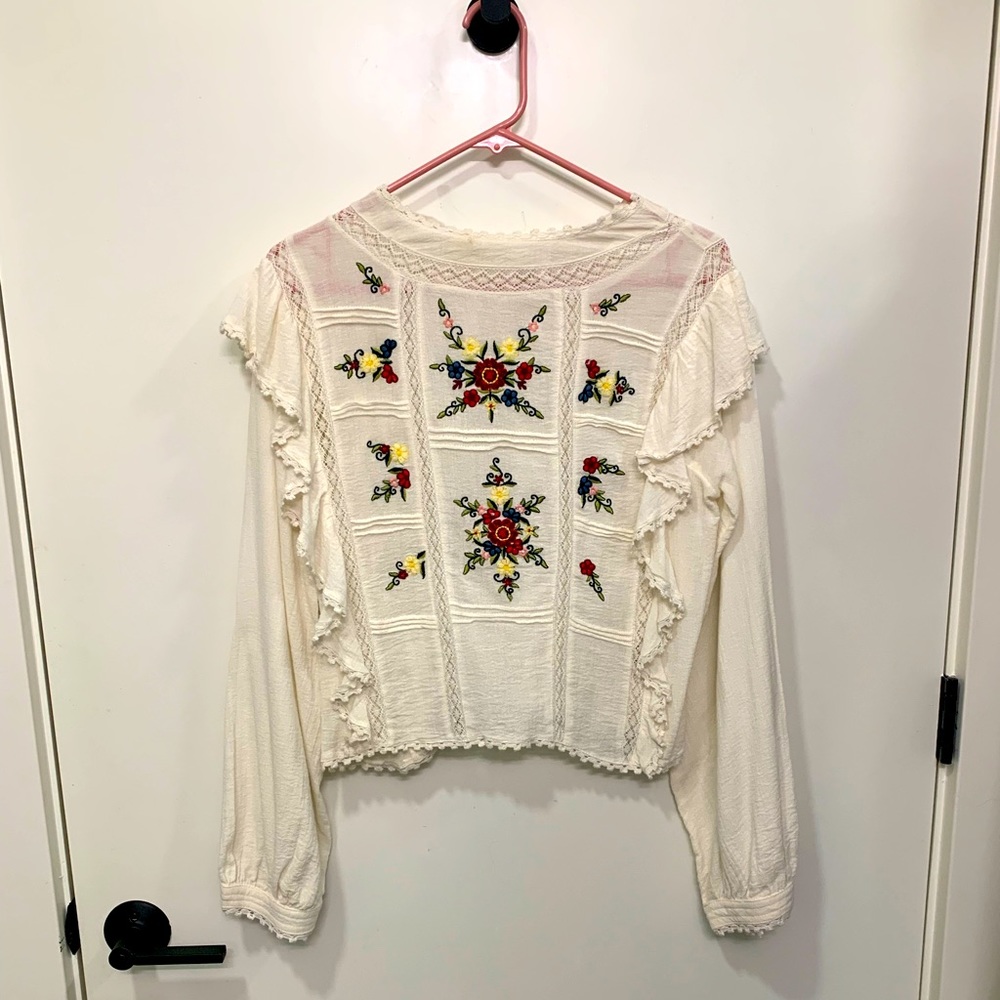 Free People blouse with beautiful floral embroidery. Size Small.